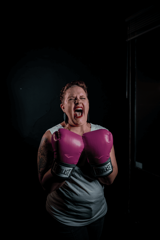 Lady in pink boxing gloves